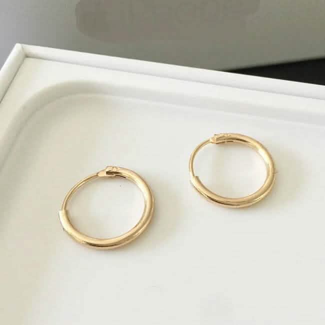 Pendientes de aro infinitos de oro de 18 quilates