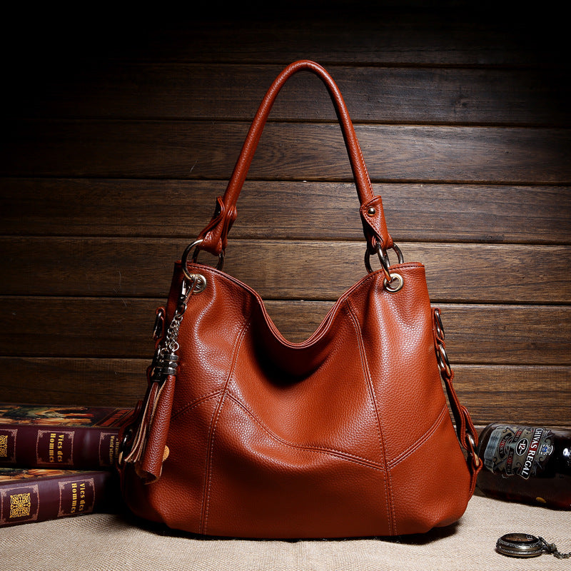 Women's Hand-held Soft Leather Tassel Big Handbags