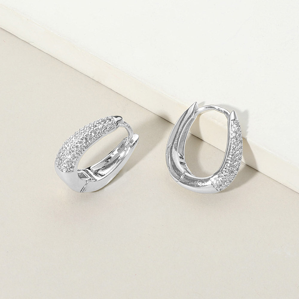 White Gold Dipped CZ Stone Paved Oval Huggie Hoop Earrings