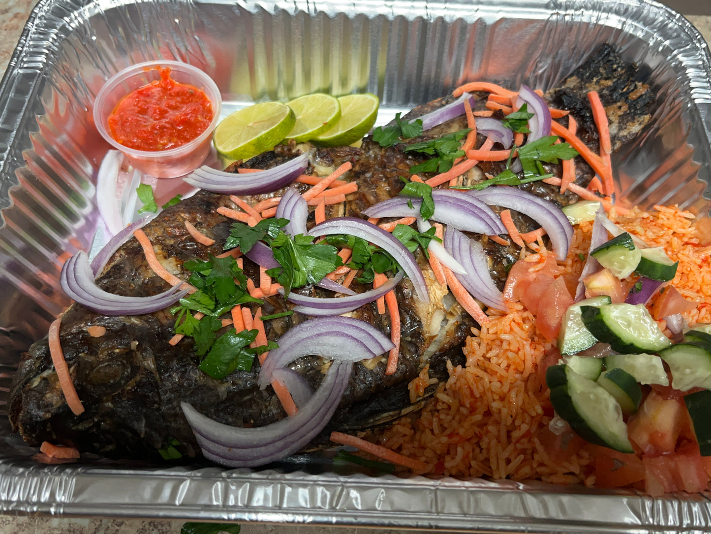 GRILLED TILAPIA WITH JOLLOF RICE