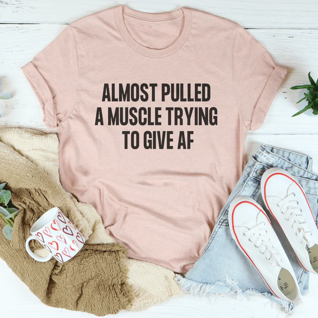Relatable Effort Humor Crewneck Tee – "Almost Pulled A Muscle Trying To Give AF"