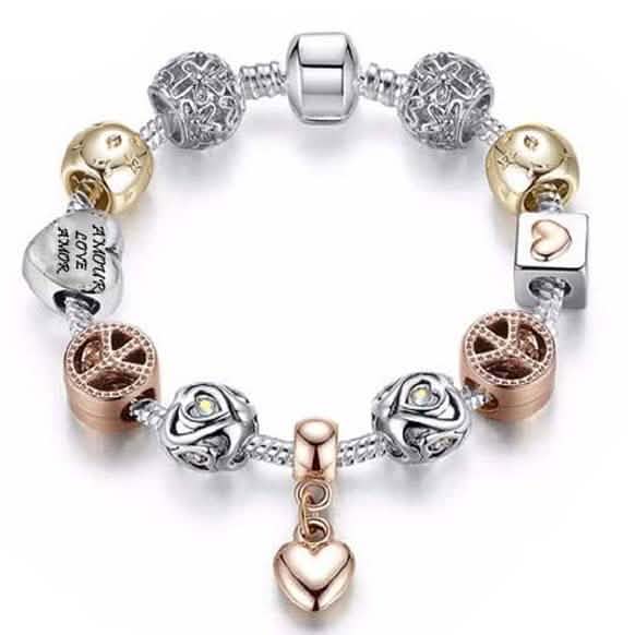 Pulsera con dije de corazón de cristal en oro