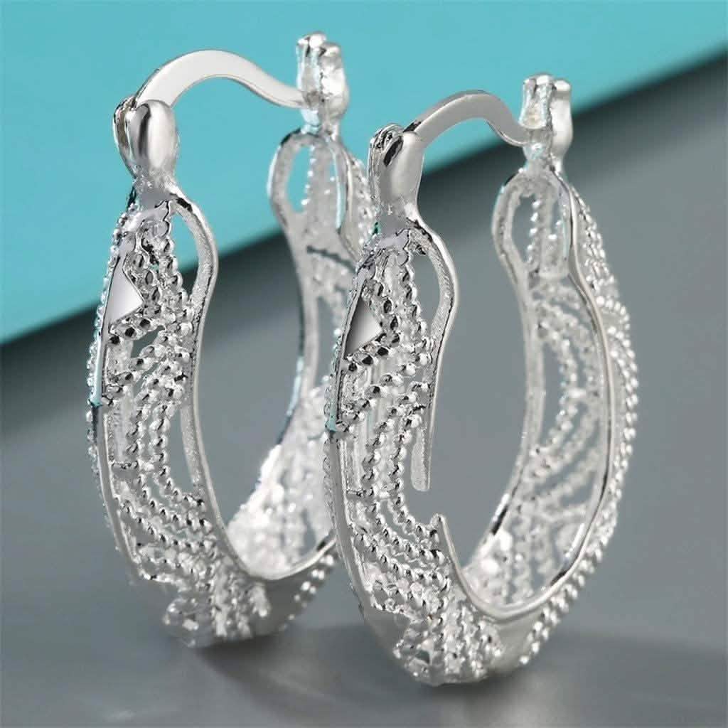 Pendientes de aro calados con corte de diamante