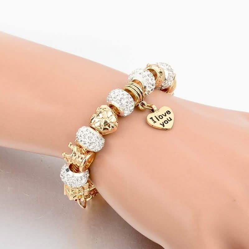 Pulsera con dije "Te amo" de cristal austriaco dorado