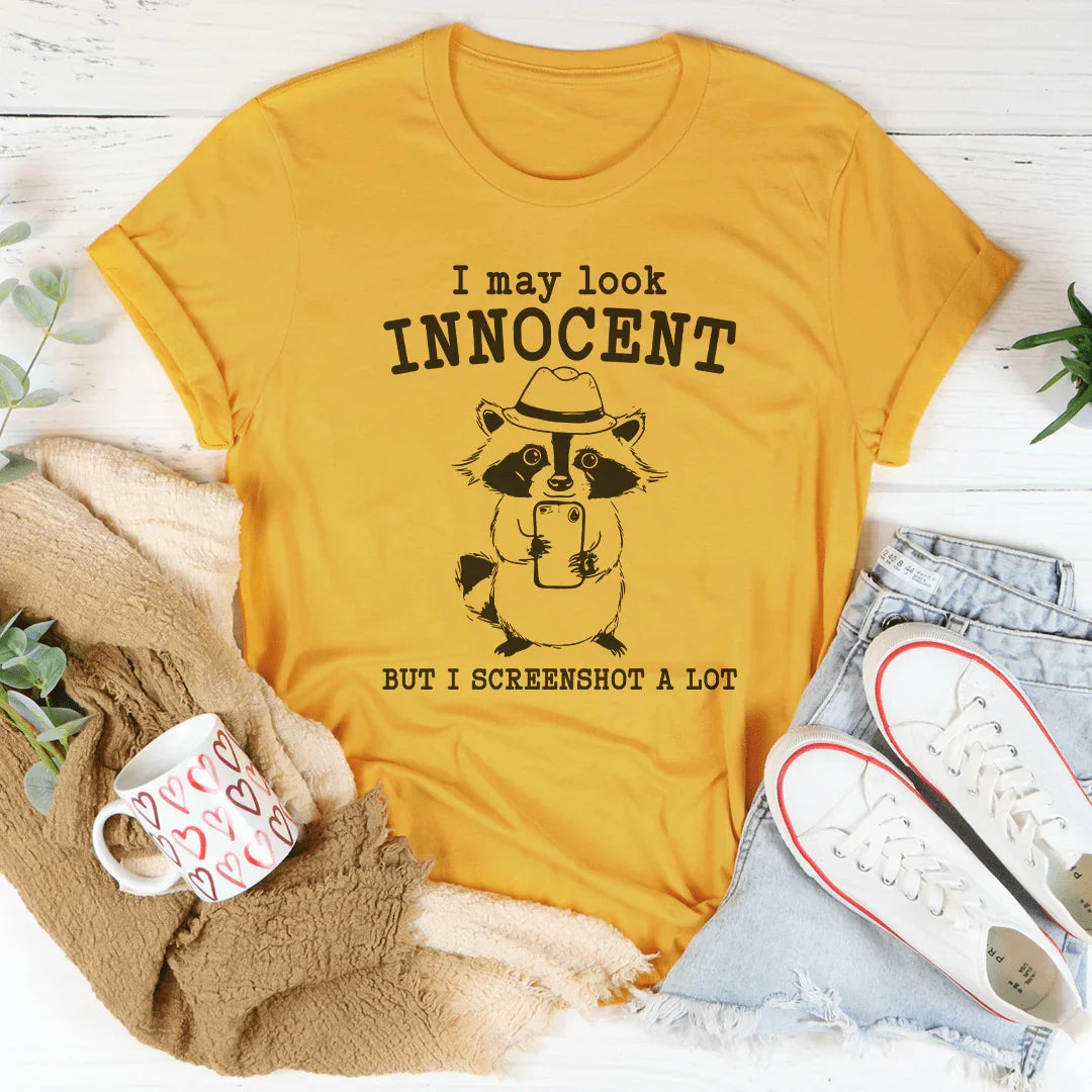 I May Look Innocent But I Screenshot A Lot Tee