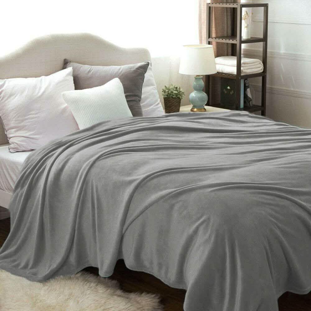 Mantas de cama Kathy Ireland Flannel Solid Microplush