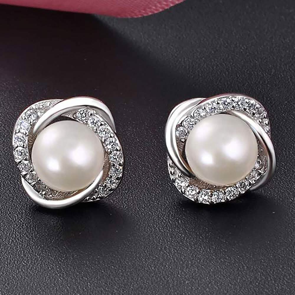 Aretes de perlas y cristales Swarovski Love en oro blanco