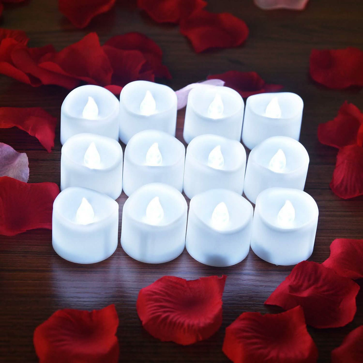 Juego de 12 velas LED de té con 100 pétalos de rosa artificiales
