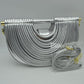 Structured Half-Moon Clutch Bag with Tubular Stitching and Shoulder Strap