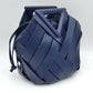 Geometric Wide Weave Bucket Bag with Triangular Top Handle