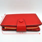 Compact Pebbled Everyday Wallet with Snap and Zipper Closure