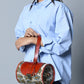 Cylindrical Block Printed Leather Bag