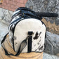 Pony Skin Bag: Luxury Cowhide Duffel, Roomy Travel Carry-On, Designer Luggage for Getaways