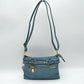 Multi-Zipper Crossbody Bag with Adjustable Strap and Gold Hardware