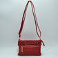 Multi-Zipper Crossbody Bag with Adjustable Strap and Gold Hardware