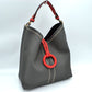 Pebbled Bucket Bag with Contrast Ring Accent and Top Handle