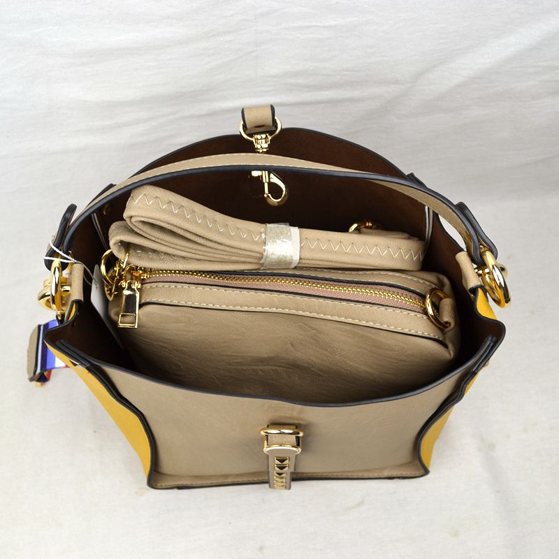 Studded Two-Tone Bucket Bag with Top Handle and Decorative Strap