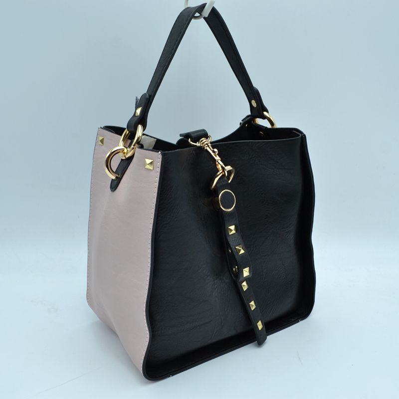 Studded Two-Tone Bucket Bag with Top Handle and Decorative Strap