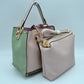 Studded Two-Tone Bucket Bag with Top Handle and Decorative Strap
