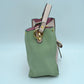 Studded Two-Tone Bucket Bag with Top Handle and Decorative Strap