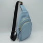 Ribbed Sling Bag with Tiered Zippers and Tassel Pulls