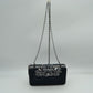 Studded Evening Clutch with Ornate Leaf Clasp Detail