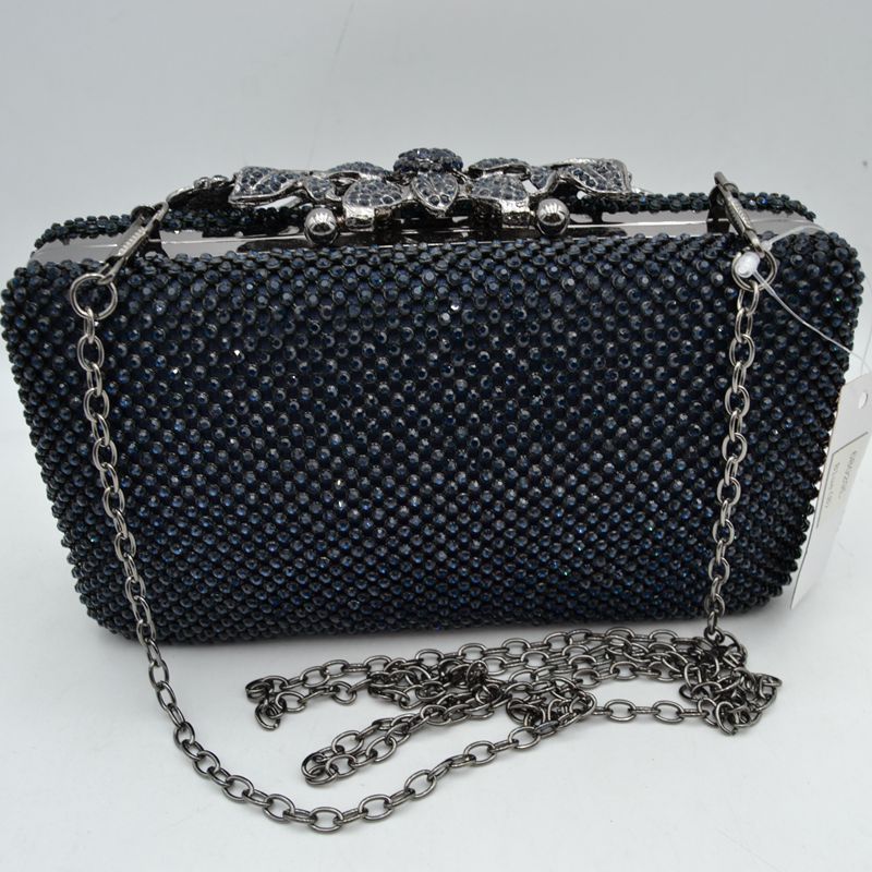 Studded Evening Clutch with Ornate Leaf Clasp Detail