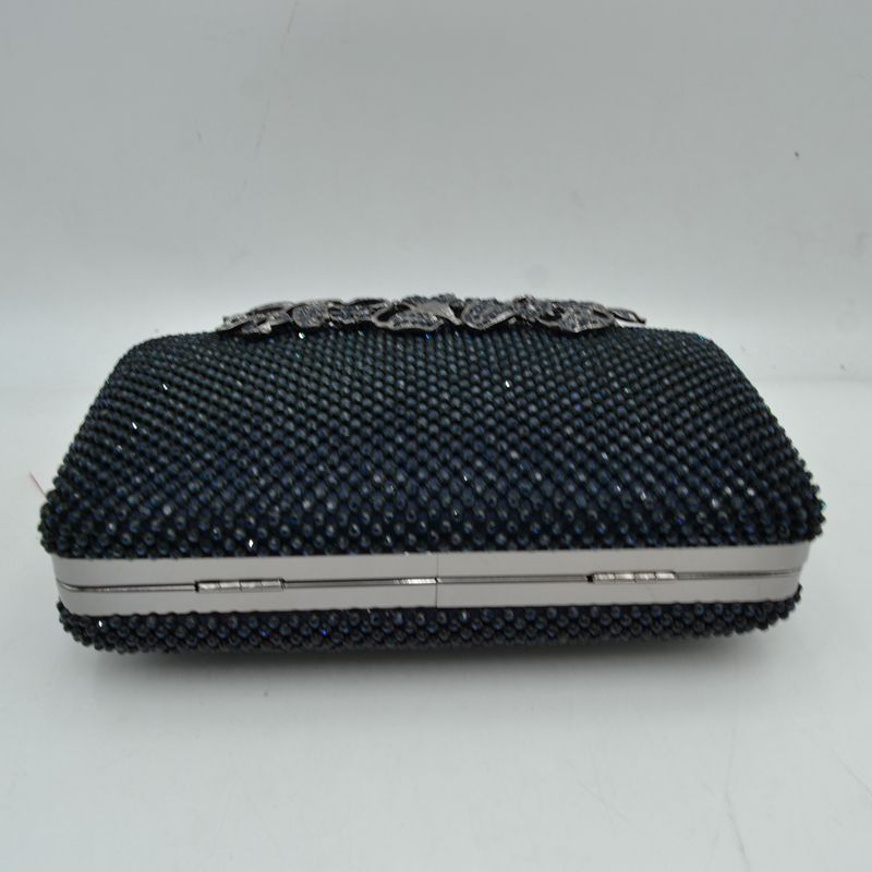Studded Evening Clutch with Ornate Leaf Clasp Detail