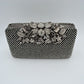 Studded Evening Clutch with Ornate Leaf Clasp Detail
