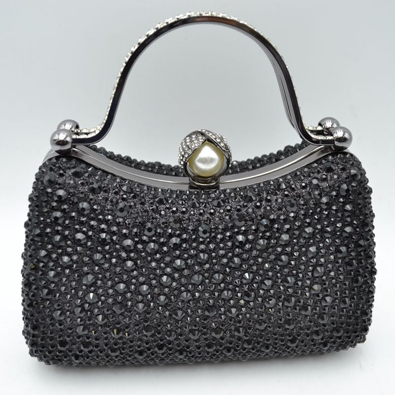 Rhinestone Encrusted Evening Clutch Bag with Pearl Clasp and Metal Handle