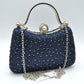 Rhinestone Encrusted Evening Clutch Bag with Pearl Clasp and Metal Handle