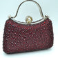 Rhinestone Encrusted Evening Clutch Bag with Pearl Clasp and Metal Handle