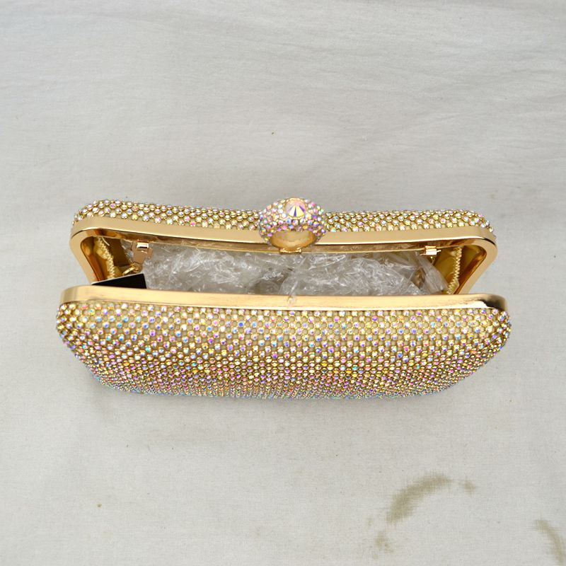 Shimmering Studded Clutch Bag with Textured O-Ring Clasp