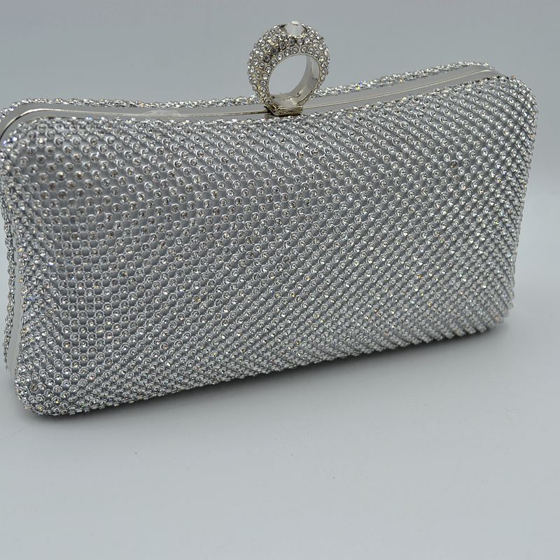 Shimmering Studded Clutch Bag with Textured O-Ring Clasp