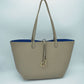 Classic Trapeze Tote Bag with Dual Handles and Ring Detail