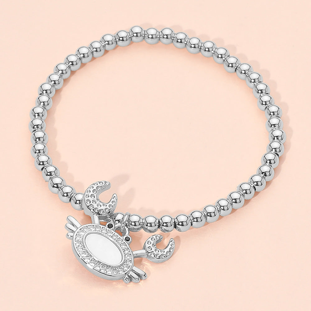 Women's Stainless Steel Mother of Pearl CZ Stone Paved Crab Charm Beaded Stretch Bracelet