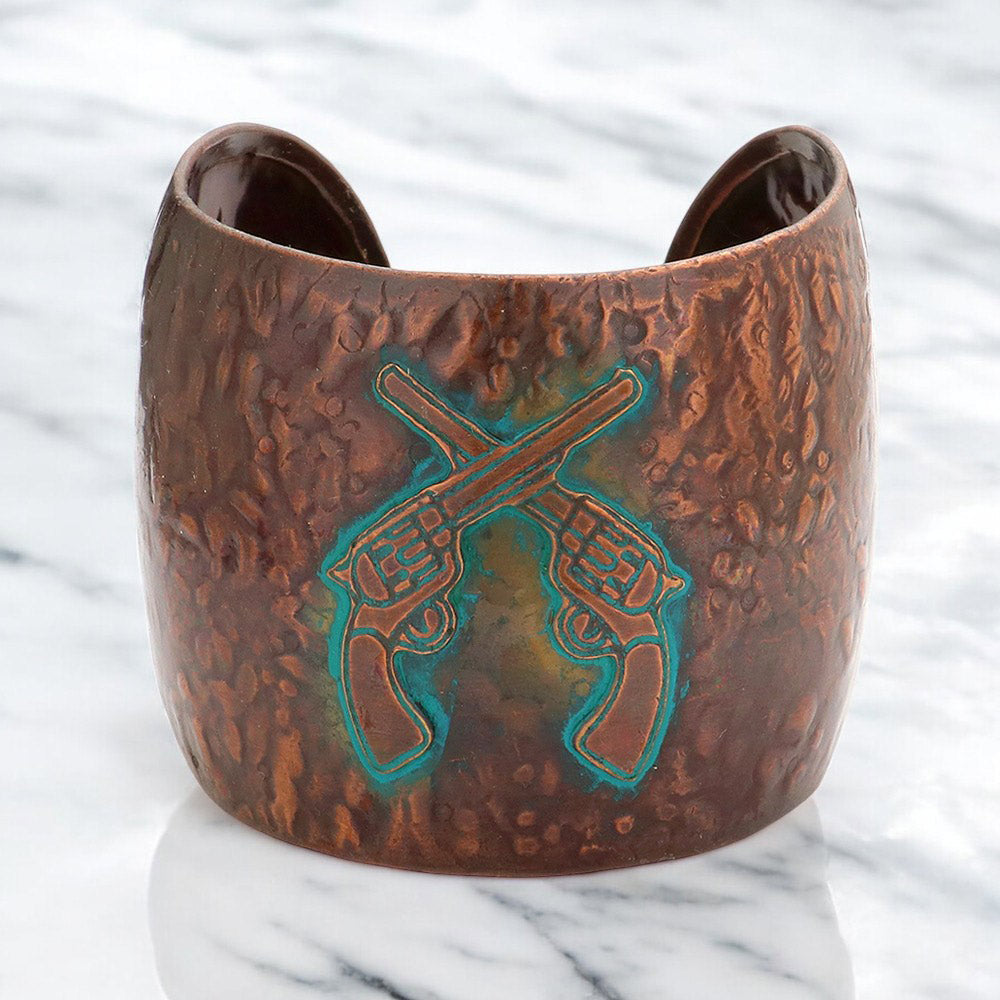 Hammered metal crossed gun cuff bracelet