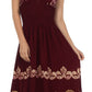 Sakkas Batik Triangle Smocked Empire Waist Dress