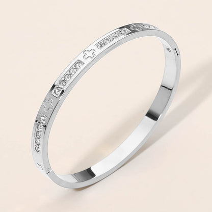 Stainless Steel CZ Accent Quatrefoil Engraved Hinged Bangle Bracelet