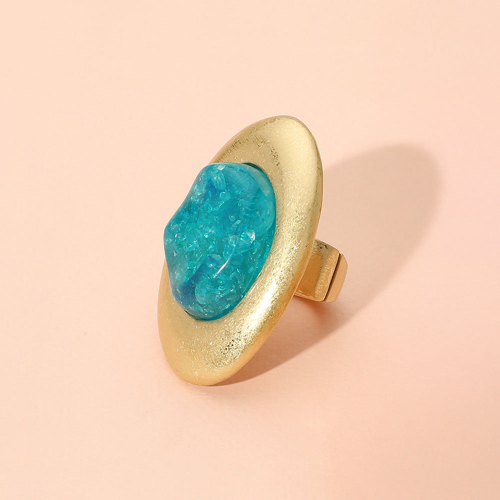 Anillo elástico ovalado de metal cepillado con cúpula de resina abstracta extragrande