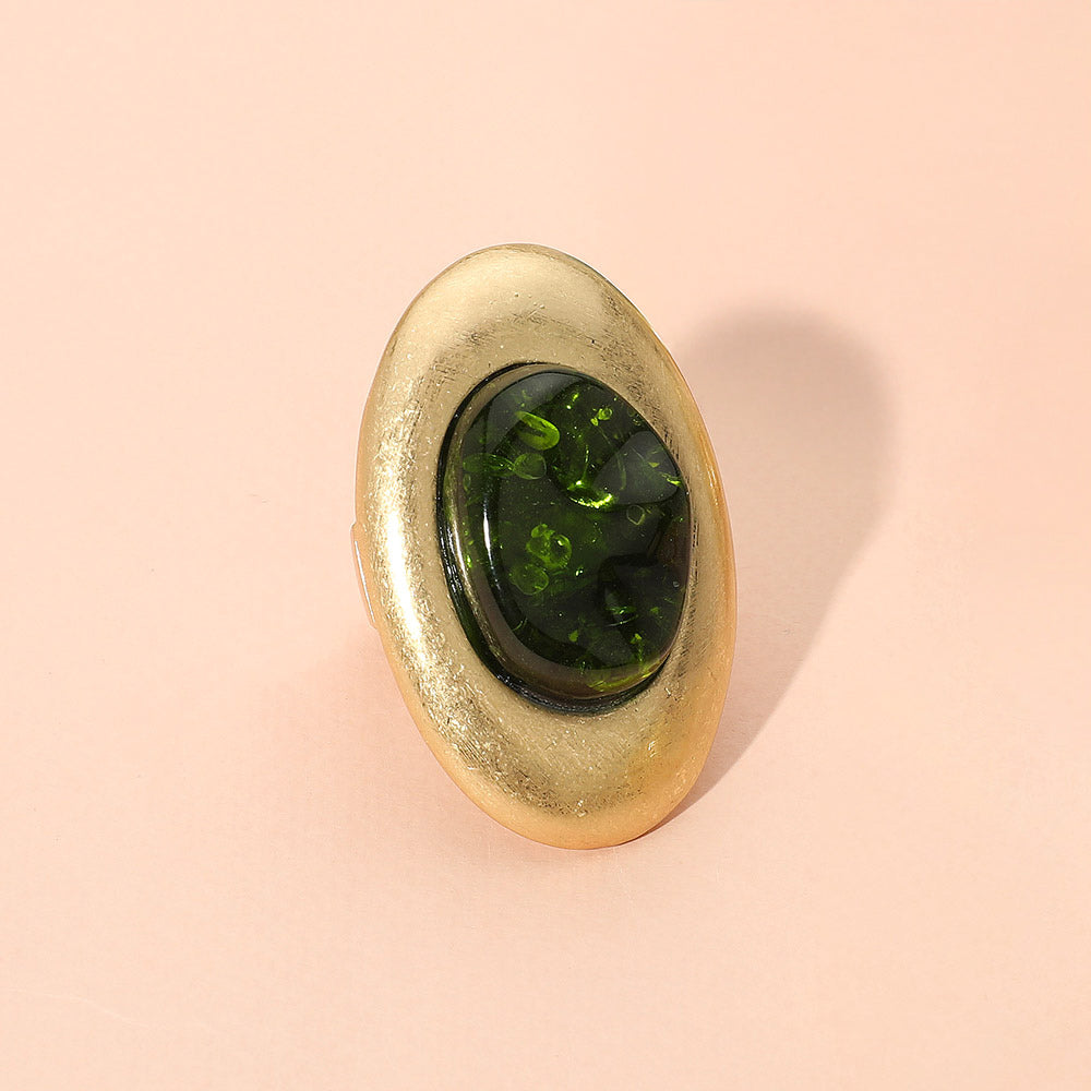 Anillo elástico ovalado de metal cepillado con cúpula de resina abstracta extragrande
