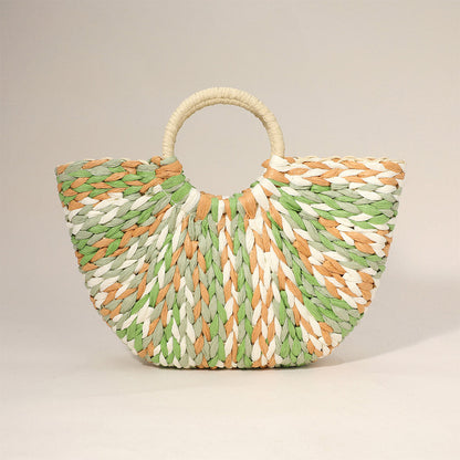 Bolso de paja natural tejido a mano con asa redonda y tejido multicolor