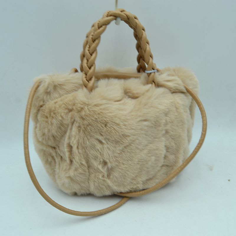 Plush Faux Fur Bucket Handbag with Braided Handles and Long Strap