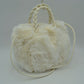 Plush Faux Fur Bucket Handbag with Braided Handles and Long Strap