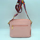 Ostrich-Embossed Dome Crossbody Bag with Dual Tassel Zippers