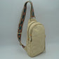 Multi-Zip Sling Backpack with Patterned Shoulder Strap