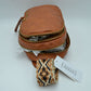 Multi-Zip Sling Backpack with Patterned Shoulder Strap