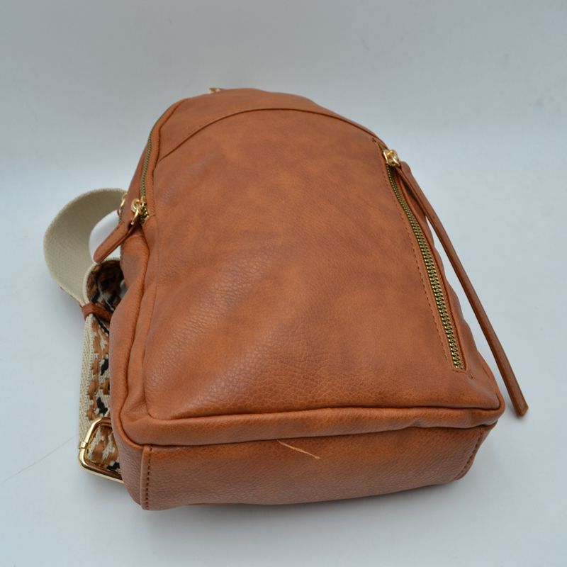 Multi-Zip Sling Backpack with Patterned Shoulder Strap