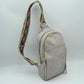 Multi-Zip Sling Backpack with Patterned Shoulder Strap
