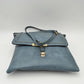 Braided Trim Flap Messenger Crossbody Bag with Metallic Bar T-Lock Closure